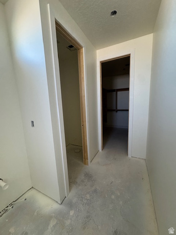 5005 North 75 East Enoch, UT 84721 - Photo 19 of 37 Hall with a textured ceiling