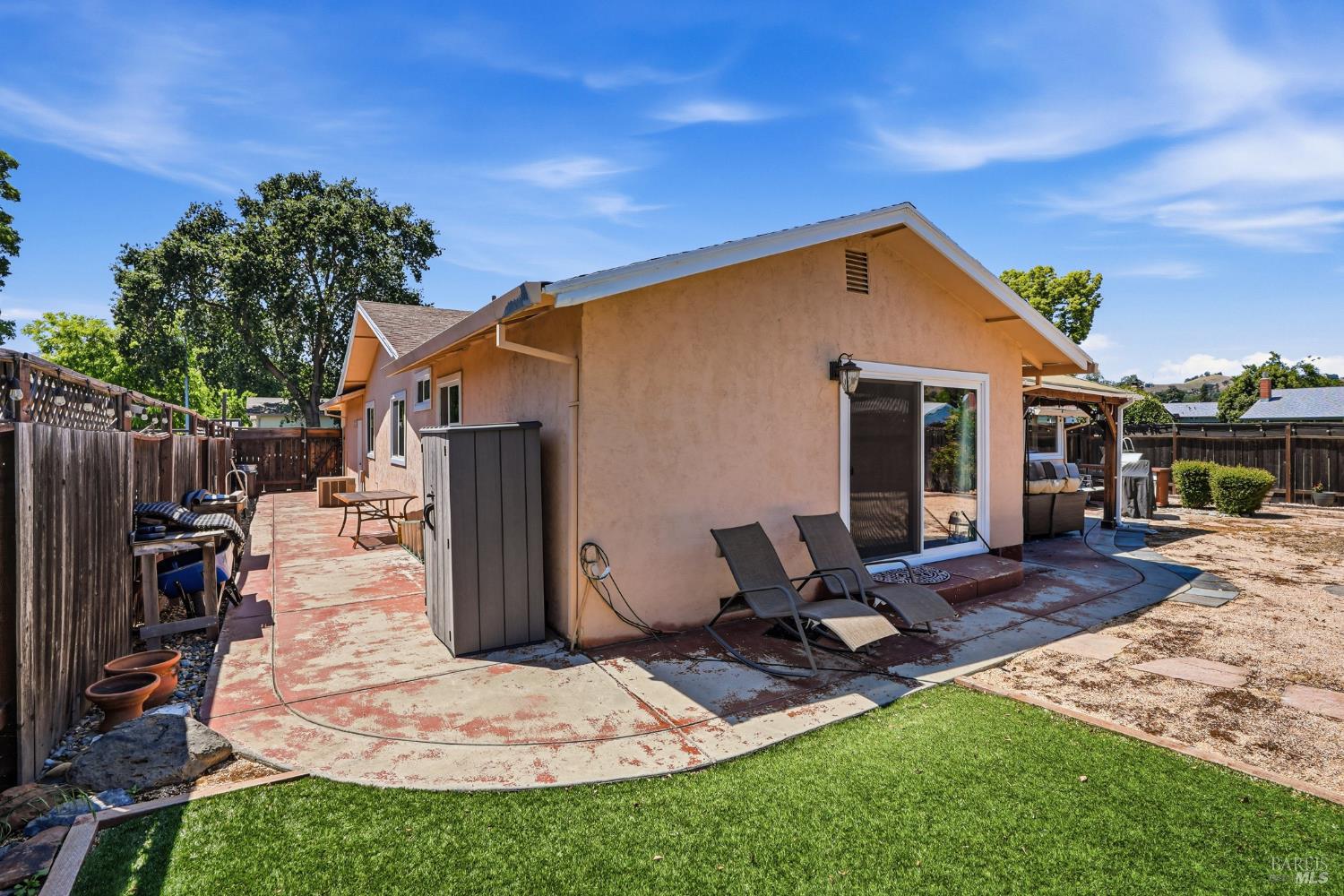 773 Blue Ridge Lane Vacaville, CA 95688 - Photo 38 of 44 a view of a backyard with furniture and a tree