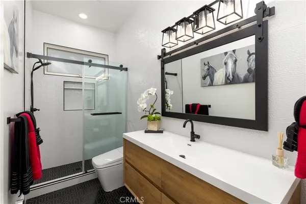a bathroom with a bathtub and shower