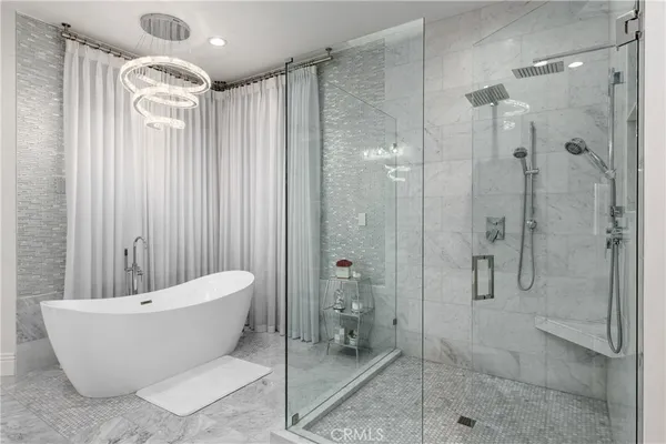 a bathroom with a sink toilet and mirror