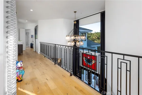 a bedroom with a bed and a mirror