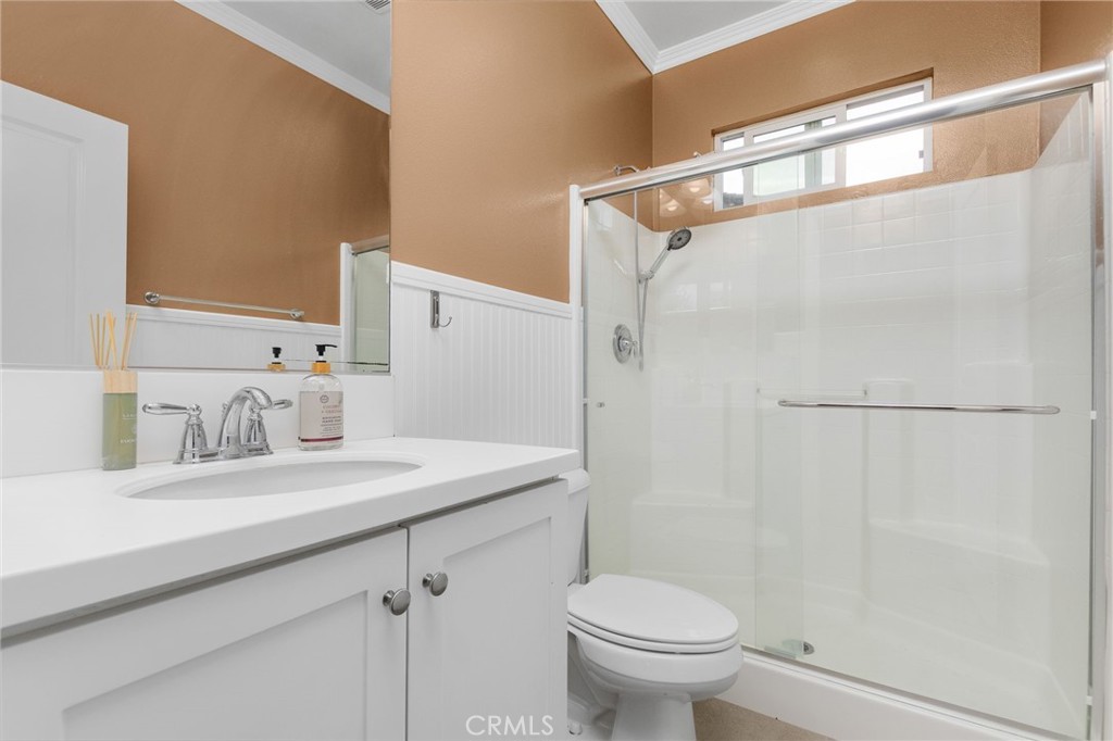 31639 Country View Road Temecula, CA 92591 - Photo 36 of 75 a bathroom with a granite countertop sink toilet and shower