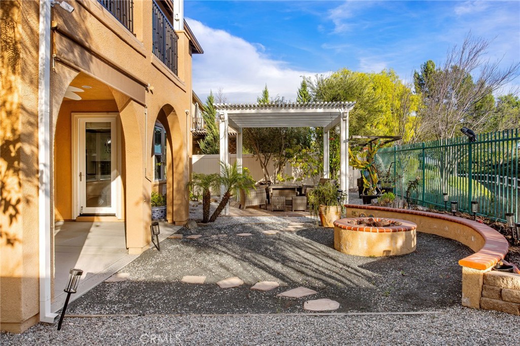 31639 Country View Road Temecula, CA 92591 - Photo 45 of 75 a view of a house with backyard porch and sitting area