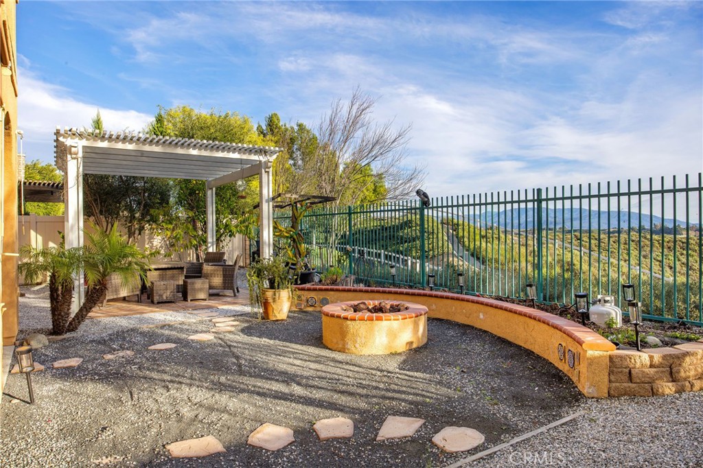 31639 Country View Road Temecula, CA 92591 - Photo 47 of 75 a view of a swimming pool with a patio