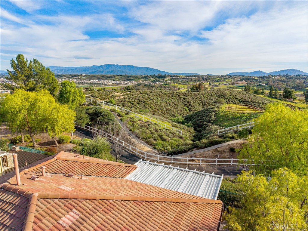 31639 Country View Road Temecula, CA 92591 - Photo 55 of 75 a view of a swimming pool with a terrace