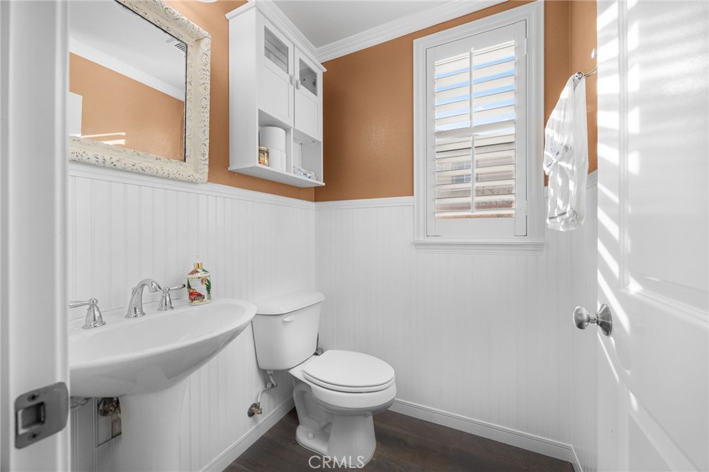 31639 Country View Road Temecula, CA 92591 - Photo 6 of 75 a bathroom with a sink a toilet and a mirror