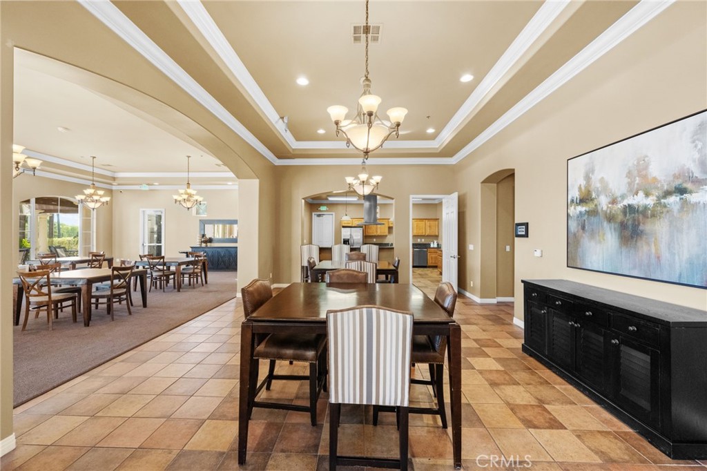 31639 Country View Road Temecula, CA 92591 - Photo 73 of 75 a view of a dining room with furniture and chandelier