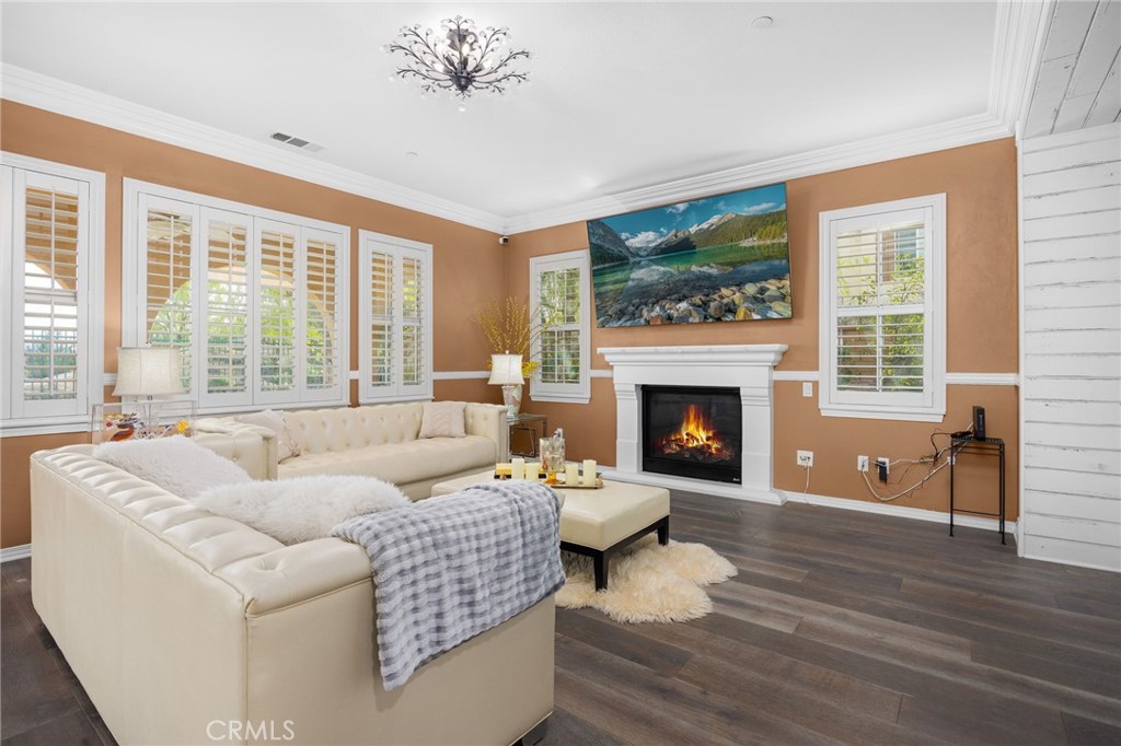 31639 Country View Road Temecula, CA 92591 - Photo 10 of 75 a living room with furniture and a fireplace