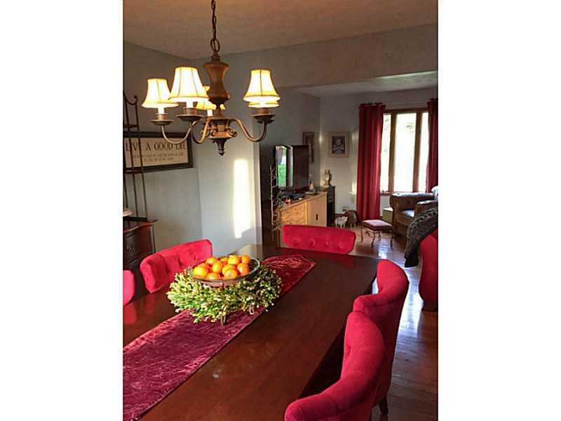 1056 Chapel Road Monaca, PA 15061 - Photo 7 of 23 Dining Room. GLEAMING HICKORY FLOORING IN DINING AREA AND LIVING ROOM!