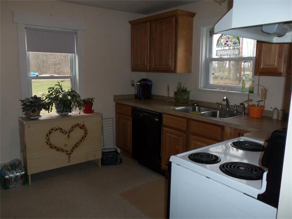 86 S Road Templeton, MA 01468 - Photo 8 of 13 a kitchen with a sink stove and window