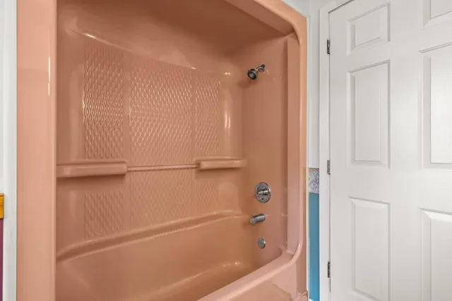 a bathroom with a bathtub