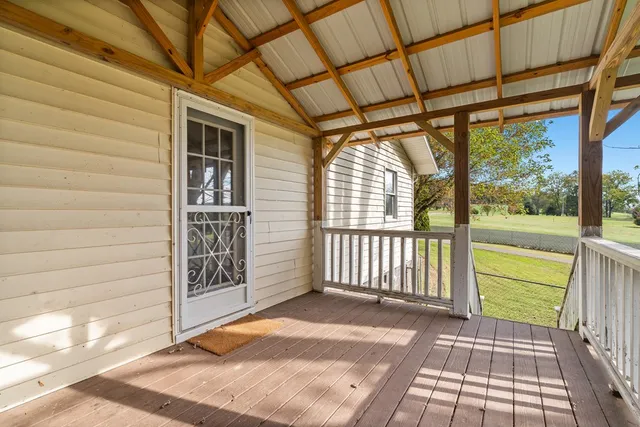 a view of a swimming pool with an ocean view