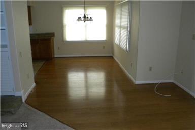 771 Bellefield Road, Unit 133 Dowell, MD 20629 - Photo 11 of 24 an empty room with windows