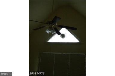 771 Bellefield Road, Unit 133 Dowell, MD 20629 - Photo 16 of 24 a picture of a room with a door open and a microwave