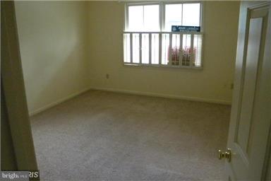 771 Bellefield Road, Unit 133 Dowell, MD 20629 - Photo 19 of 24 an empty room with a window