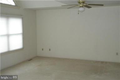 771 Bellefield Road, Unit 133 Dowell, MD 20629 - Photo 24 of 24 an empty room with a window