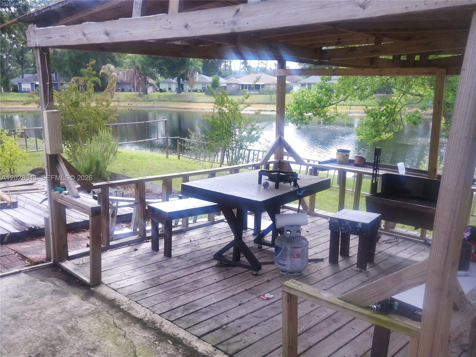 1641 Spring Oaks Lane Jacksonville, FL 32221 - Photo 37 of 44 a view of a chairs and table in the patio