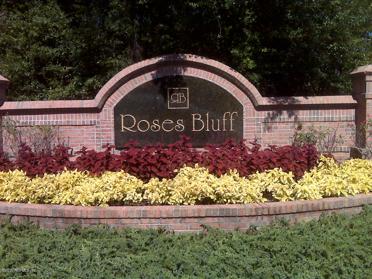 97202 Bluff View Circle, Unit LOT 38 ROSES BLUFF Yulee, FL 32097 - Photo 13 of 14 a front view of a house with a yard and garage