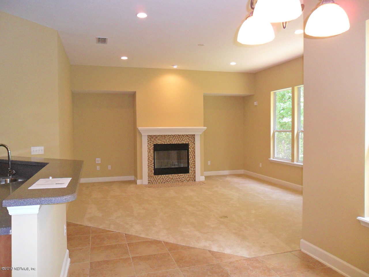 97202 Bluff View Circle, Unit LOT 38 ROSES BLUFF Yulee, FL 32097 - Photo 3 of 14 a view of an empty room with a window