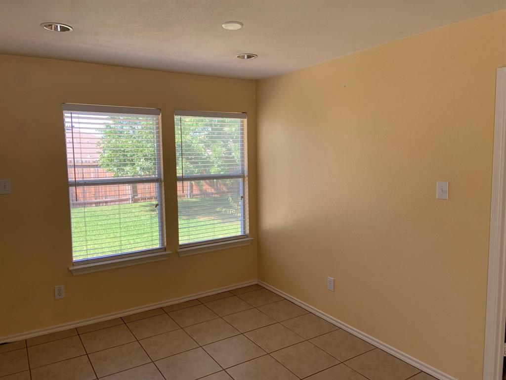 2620 Caprock Road McKinney, TX 75071 - Photo 14 of 19 Unfurnished room featuring light tile patterned floors and baseboards