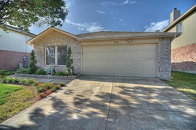 2620 Caprock Road McKinney, TX 75071 - Photo 2 of 19 Ranch-style home featuring a garage, driveway, and brick siding