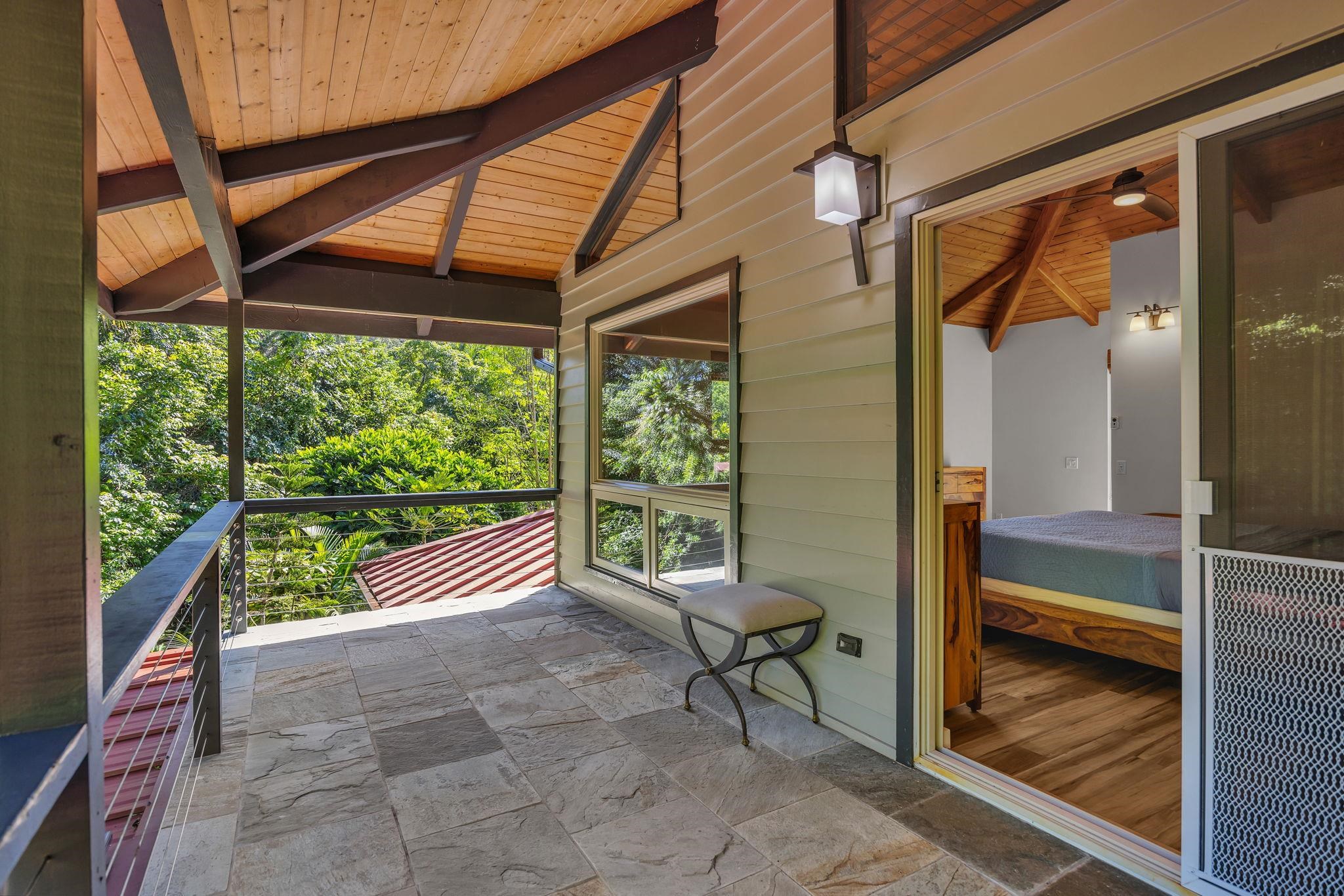 Undisclosed Address Haiku, HI 96708 - Photo 11 of 42 a balcony with chairs and outdoor view