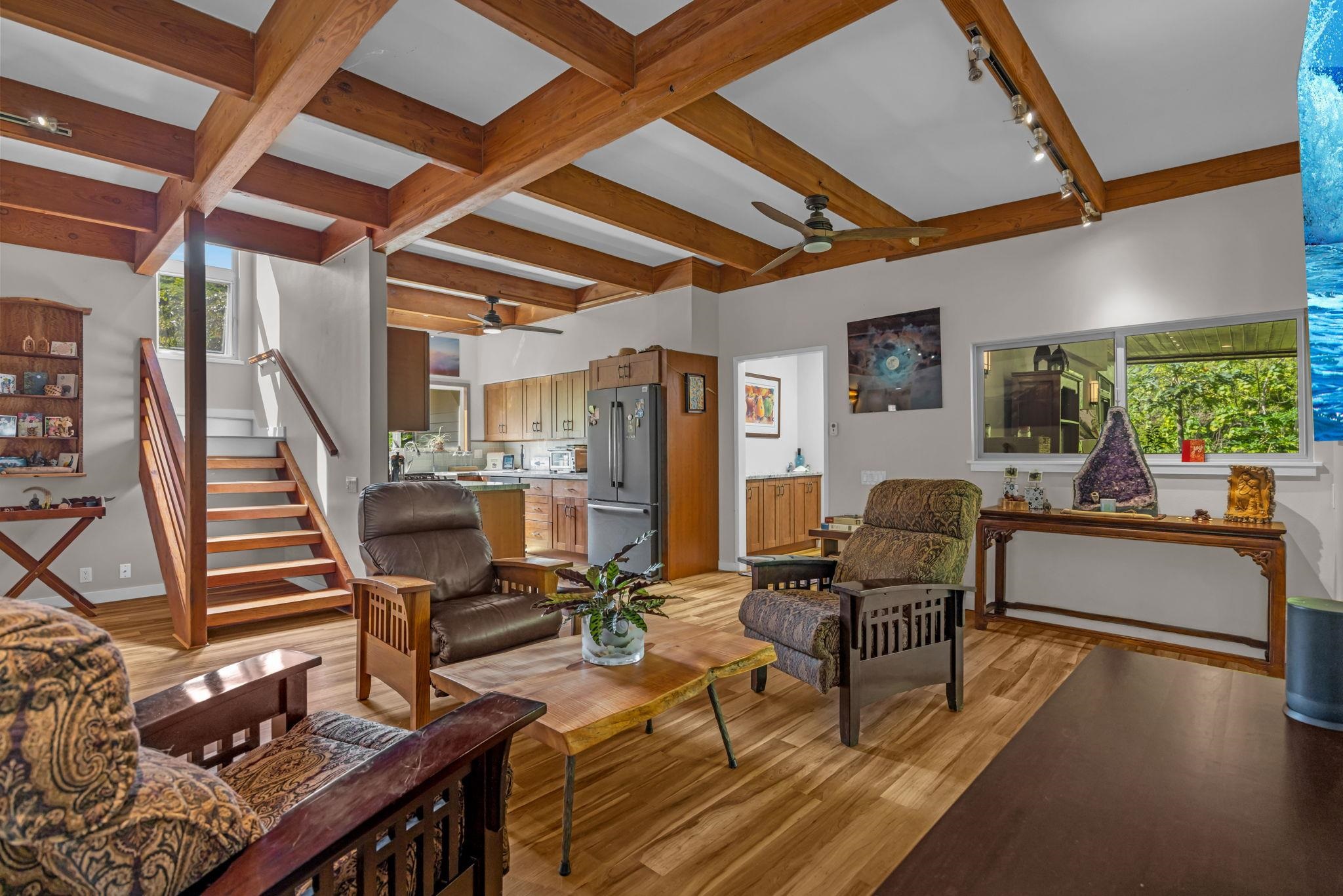 Undisclosed Address Haiku, HI 96708 - Photo 26 of 42 a living room with furniture and a wooden floor