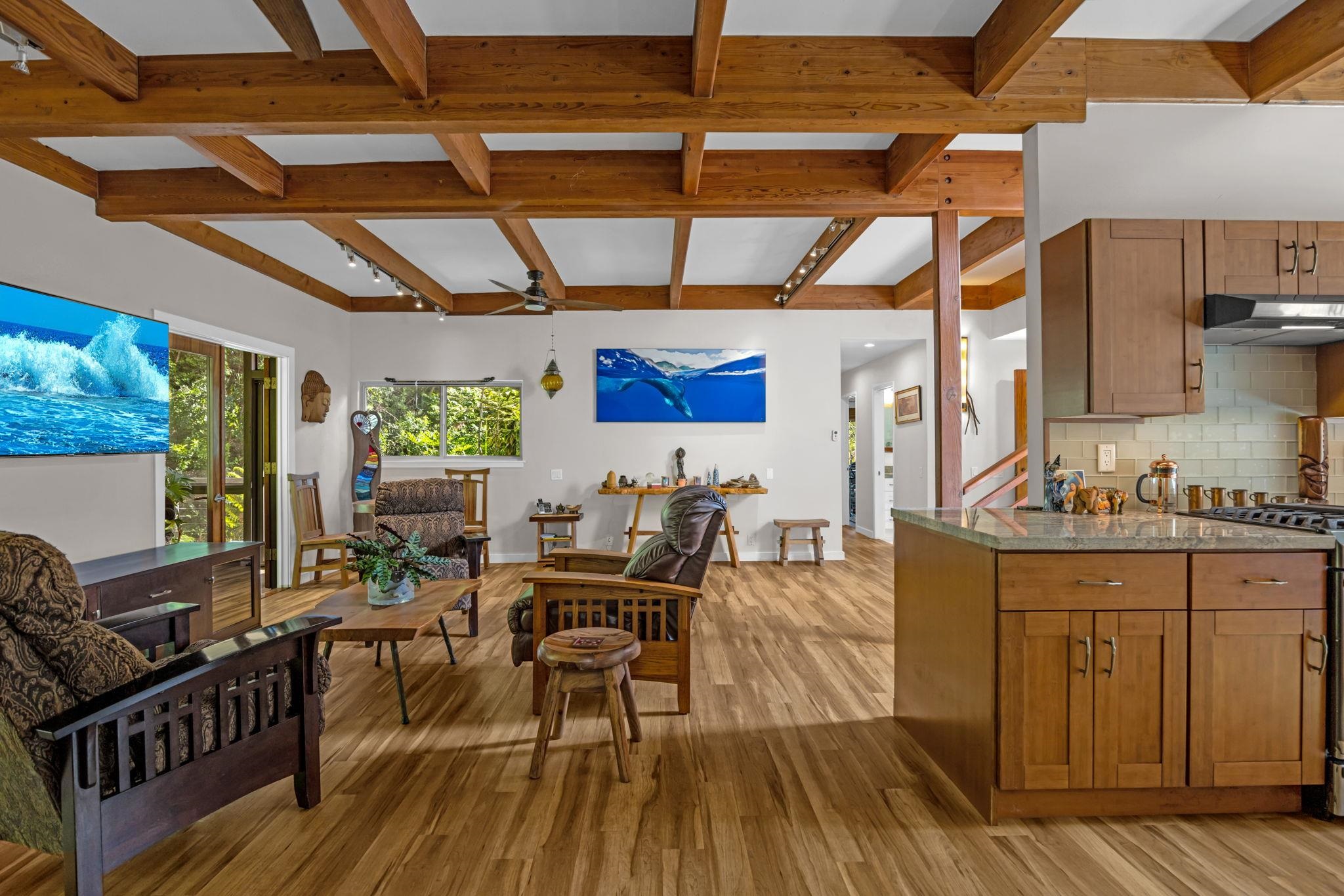 Undisclosed Address Haiku, HI 96708 - Photo 28 of 42 a view of a dining room with furniture window and wooden floor