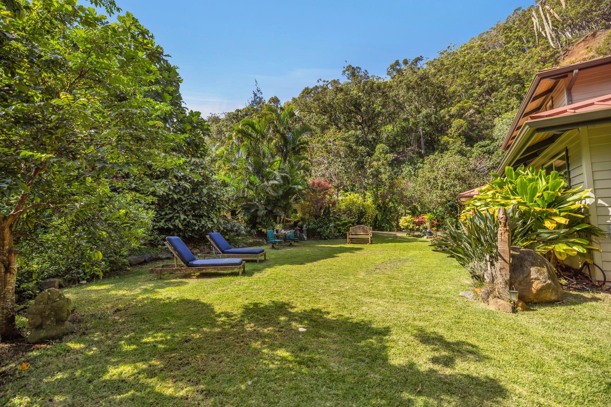Undisclosed Address Haiku, HI 96708 - Photo 32 of 42 a view of a swimming pool with an outdoor space