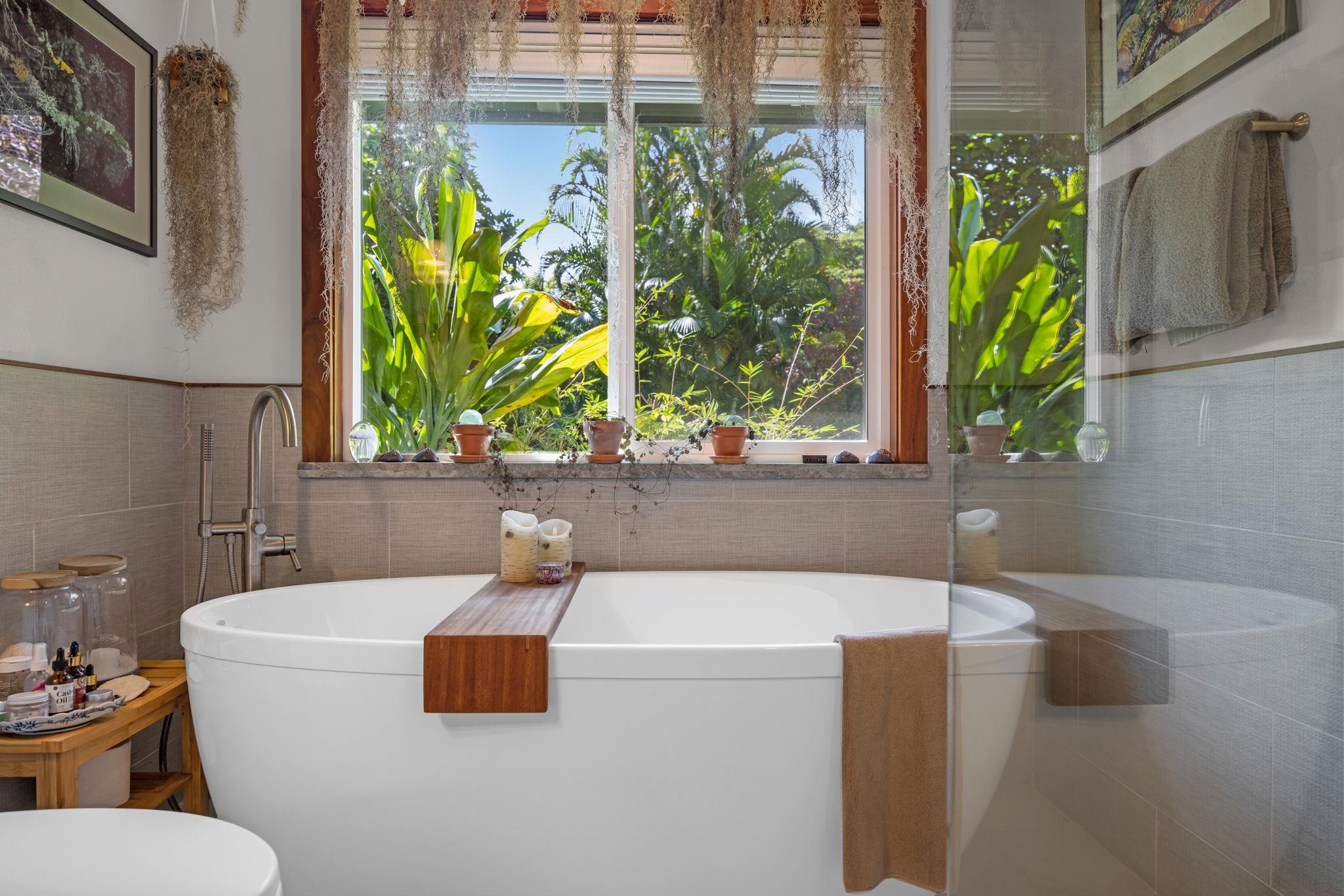 Undisclosed Address Haiku, HI 96708 - Photo 9 of 42 a bathroom with a sink and a mirror