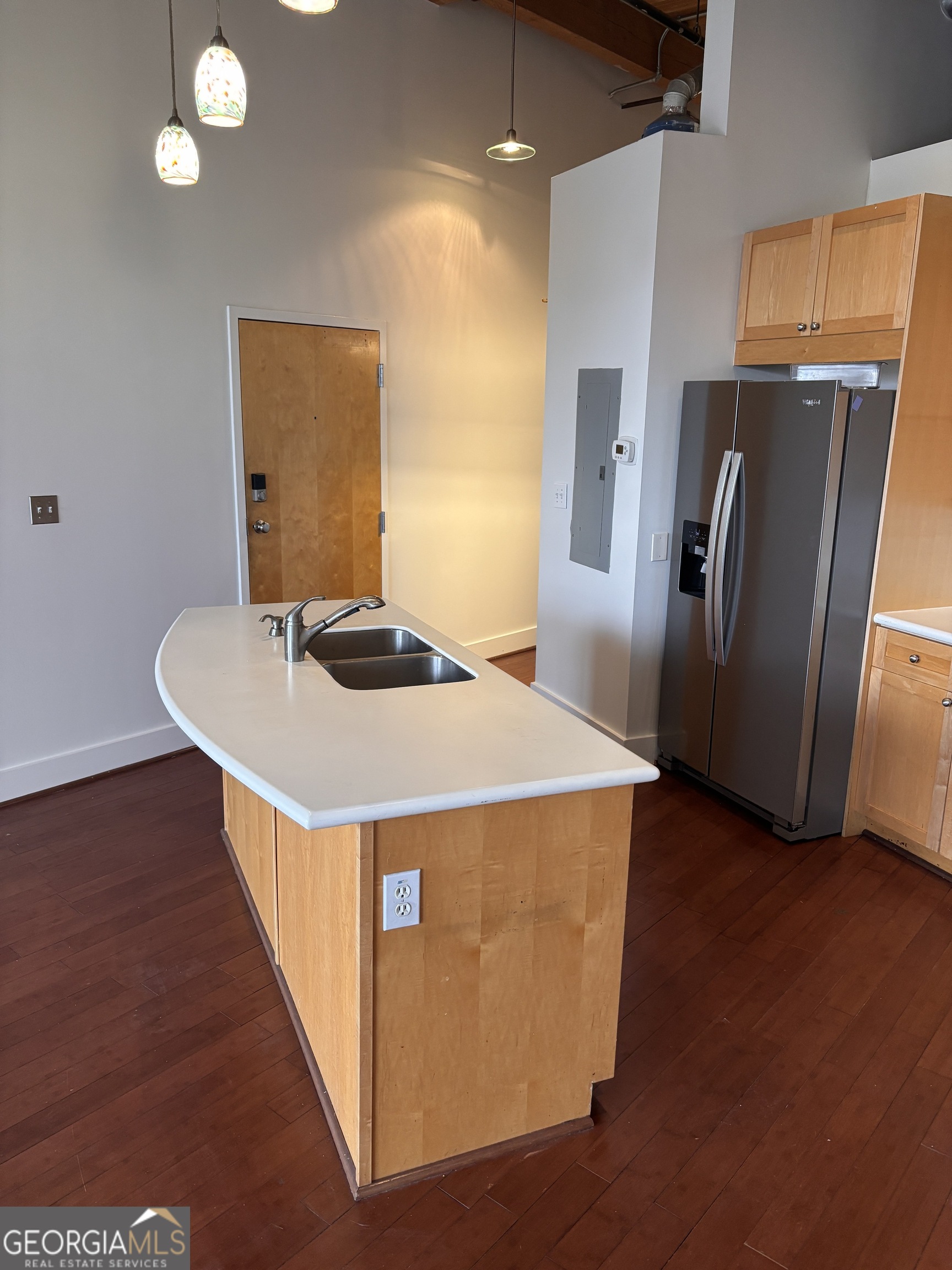 204 Walker Street Southwest Atlanta, GA 30313 - Photo 13 of 43 a kitchen that has a microwave a sink and a refrigerator