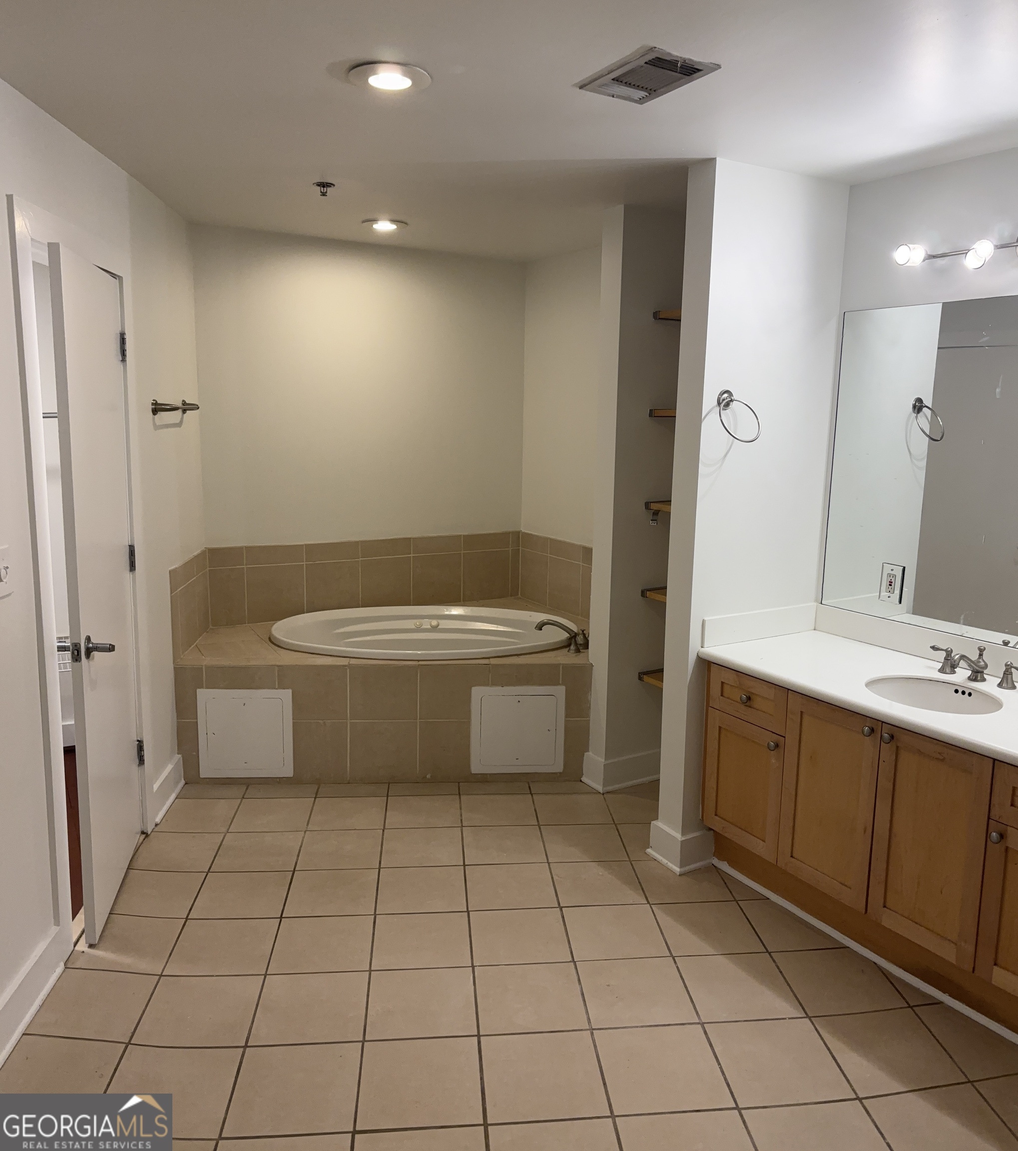 204 Walker Street Southwest Atlanta, GA 30313 - Photo 25 of 43 a bathroom with a sink a toilet and shower