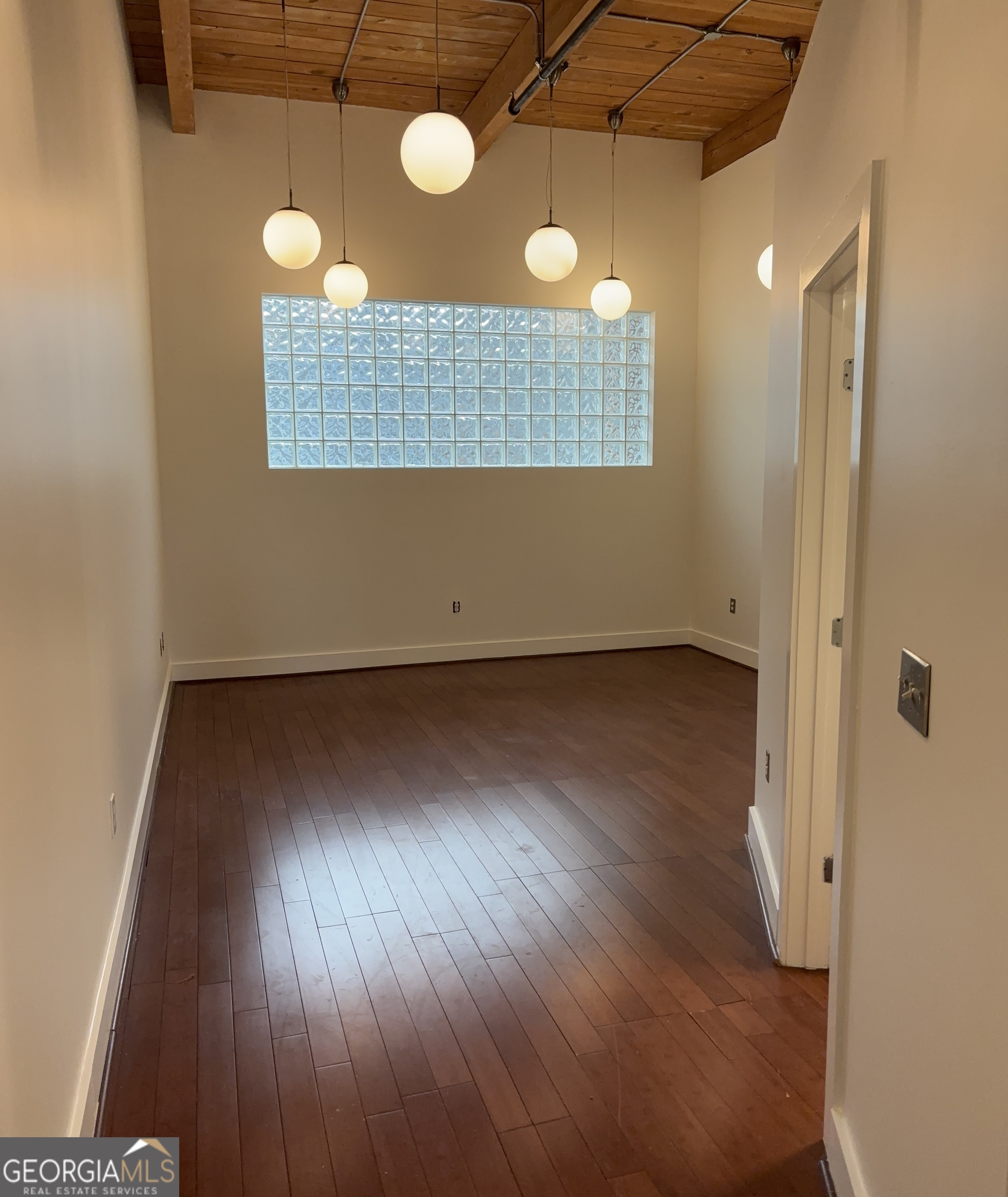 204 Walker Street Southwest Atlanta, GA 30313 - Photo 27 of 43 a view of a livingroom with wooden floor