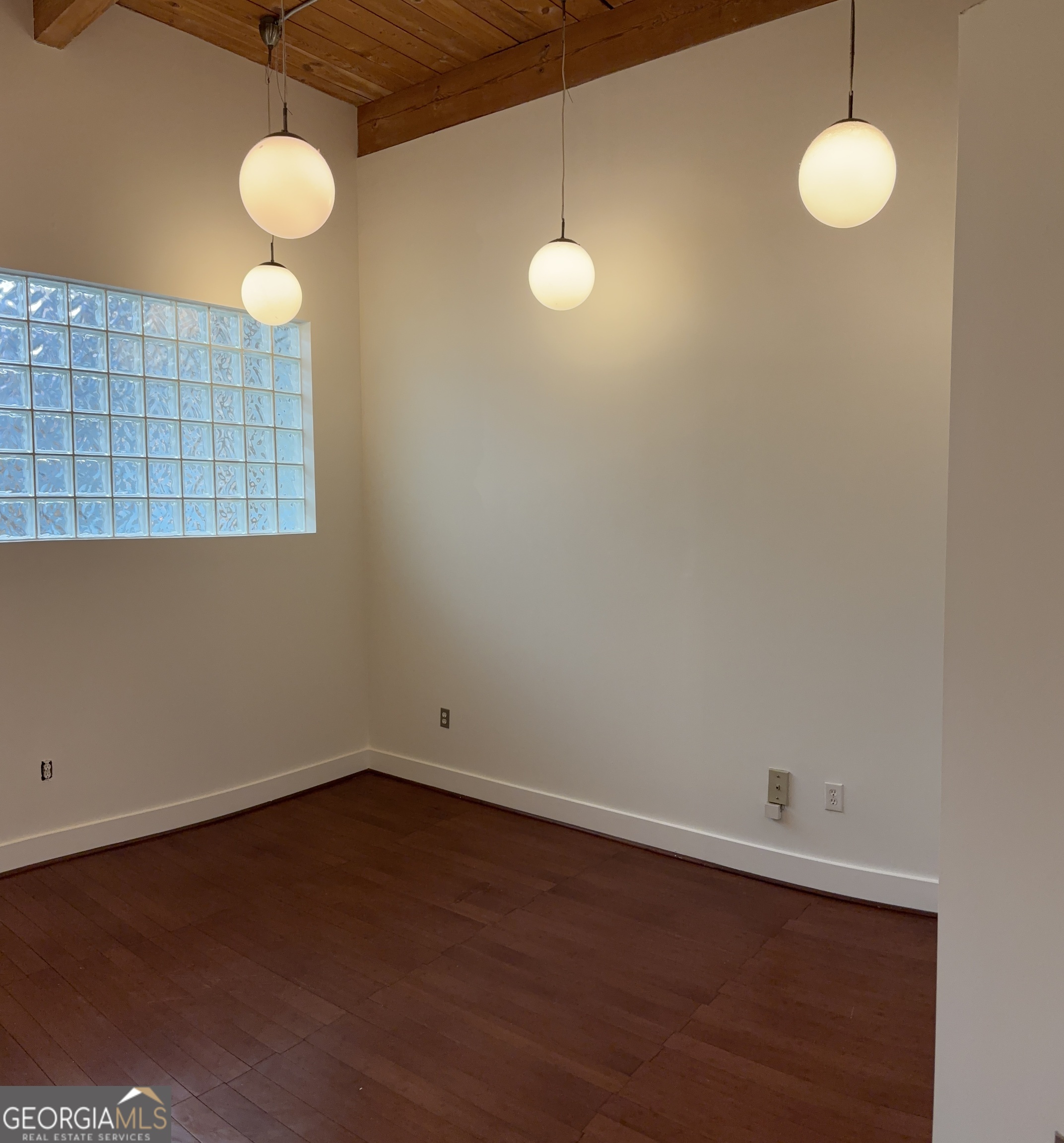 204 Walker Street Southwest Atlanta, GA 30313 - Photo 28 of 43 a view of a room with wooden floor and fan