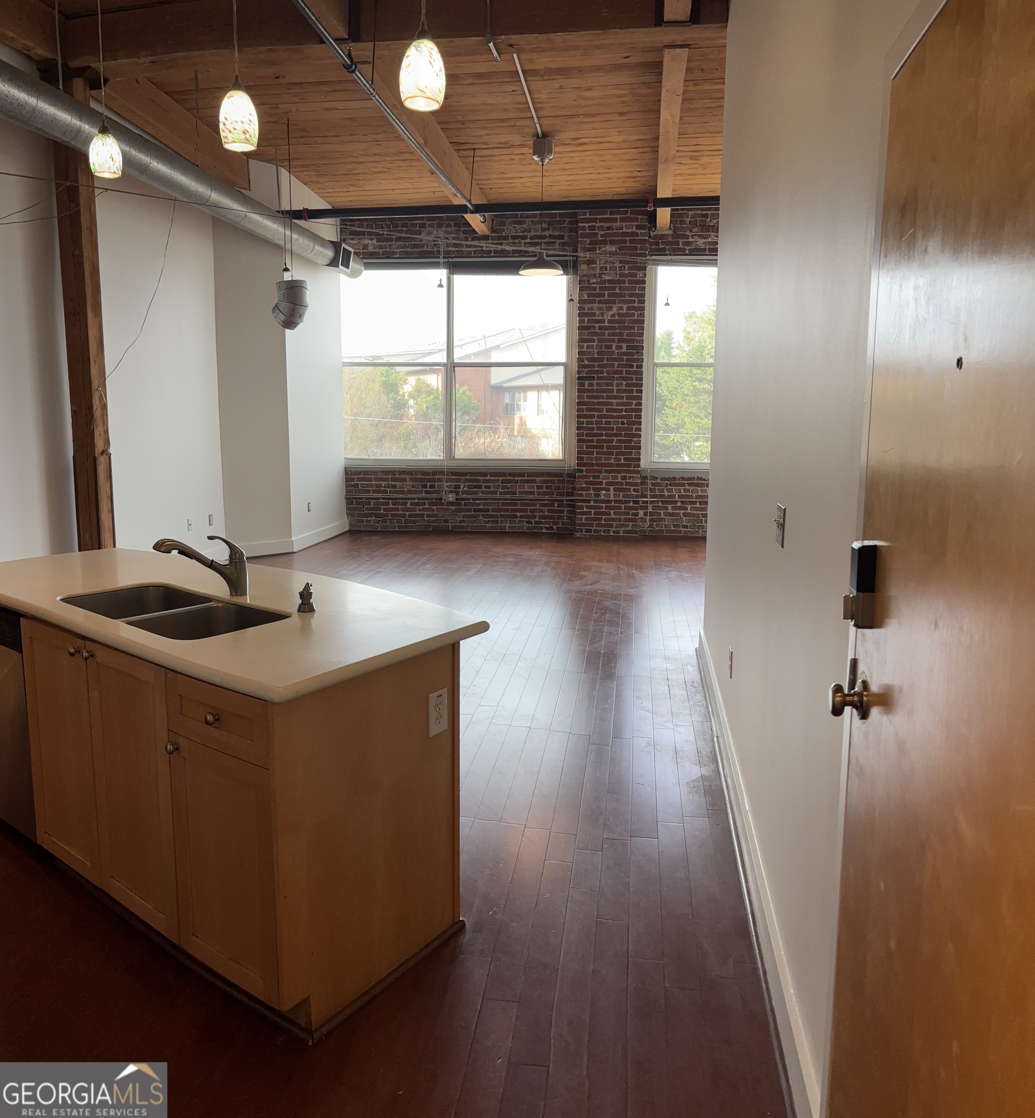 204 Walker Street Southwest Atlanta, GA 30313 - Photo 35 of 43 a room with wooden floors and window
