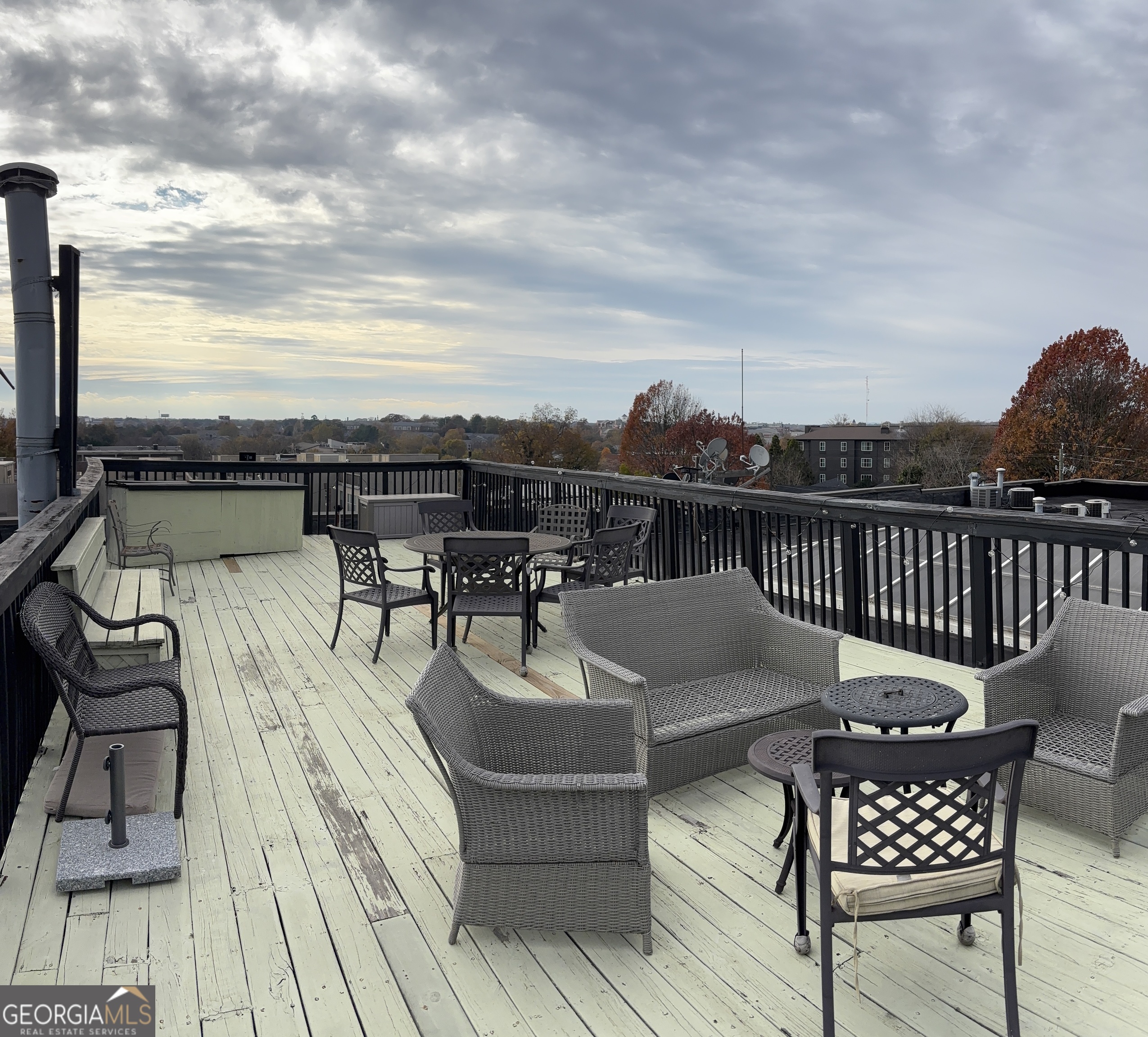 204 Walker Street Southwest Atlanta, GA 30313 - Photo 42 of 43 a view of a roof deck with patio