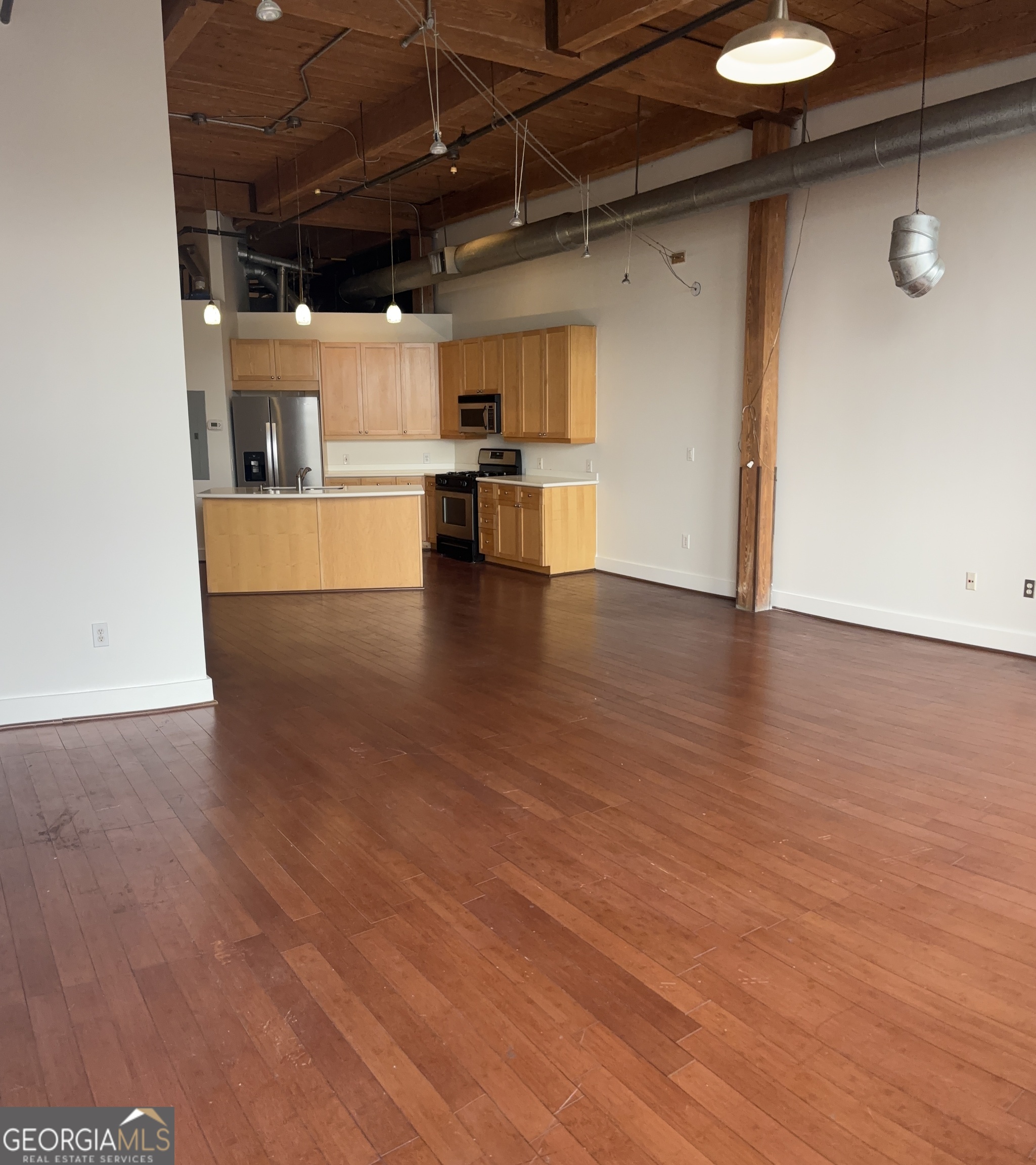 204 Walker Street Southwest Atlanta, GA 30313 - Photo 6 of 43 a view of a kitchen with a sink and a refrigerator
