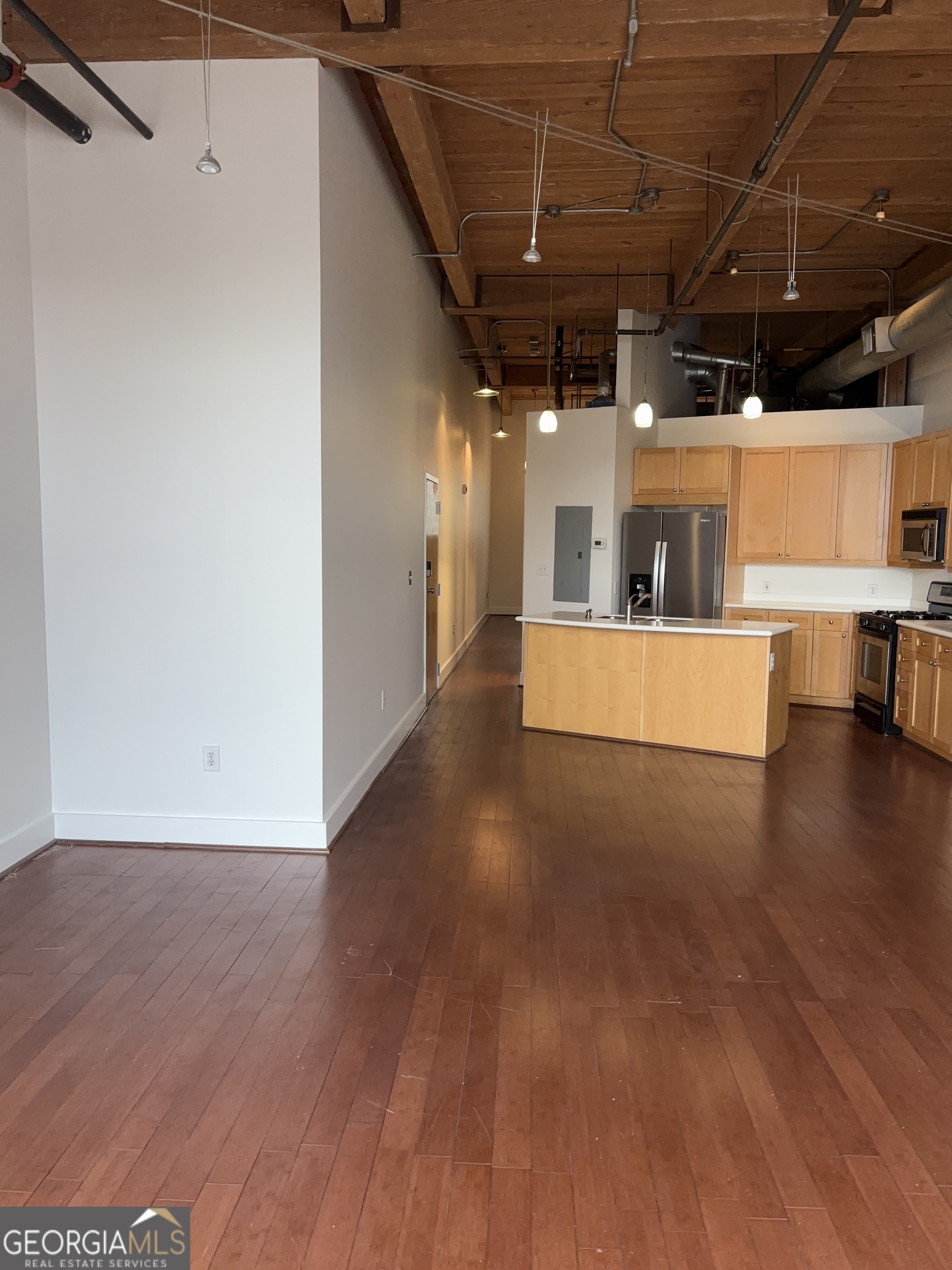 204 Walker Street Southwest Atlanta, GA 30313 - Photo 9 of 43 a view of a room with wooden floor
