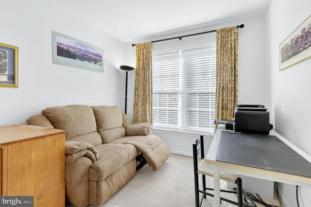 a bedroom with a bed and furniture