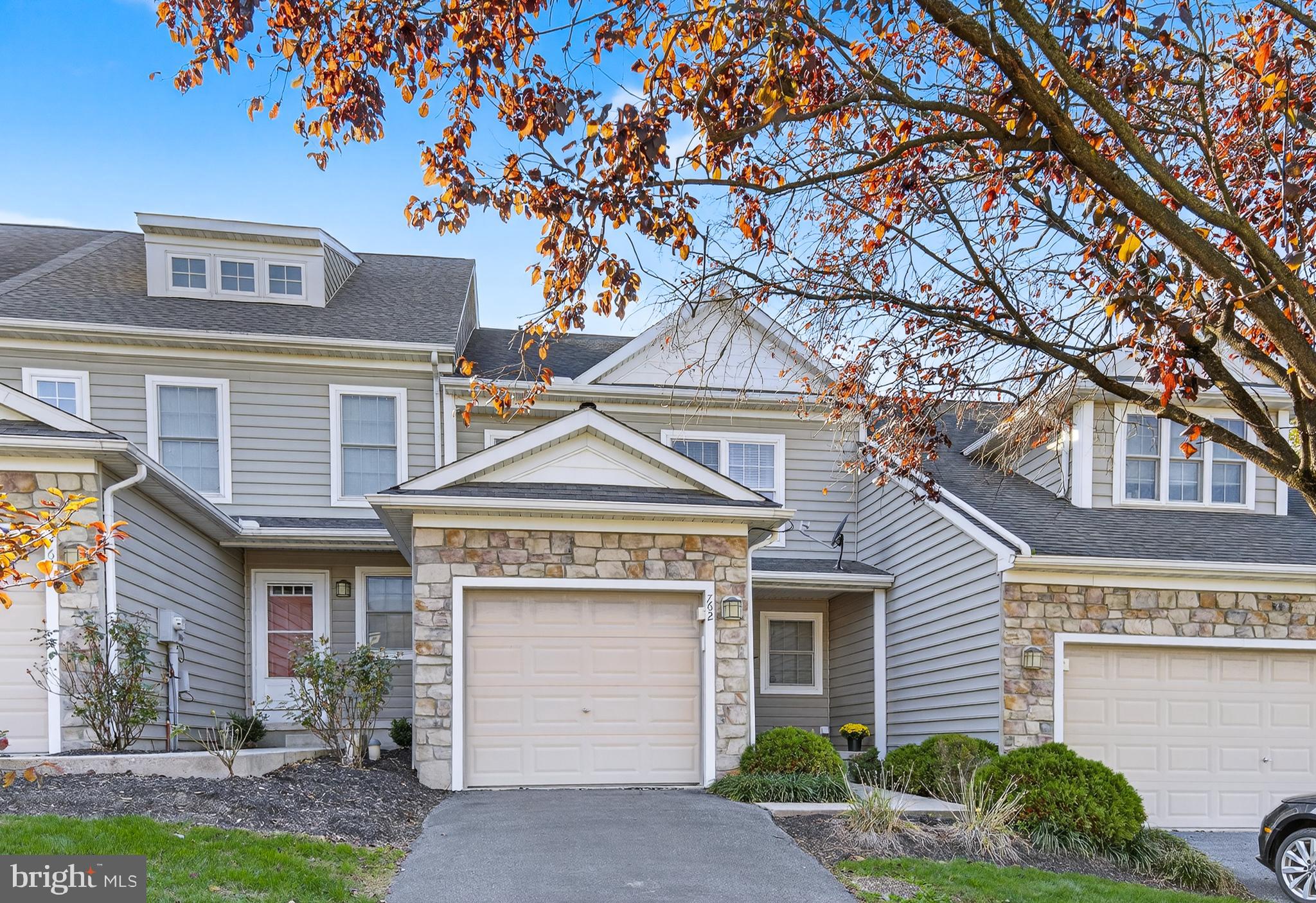 762 Keller Drive Lititz, PA 17543 - Photo 2 of 16 a front view of a house with a yard and garage