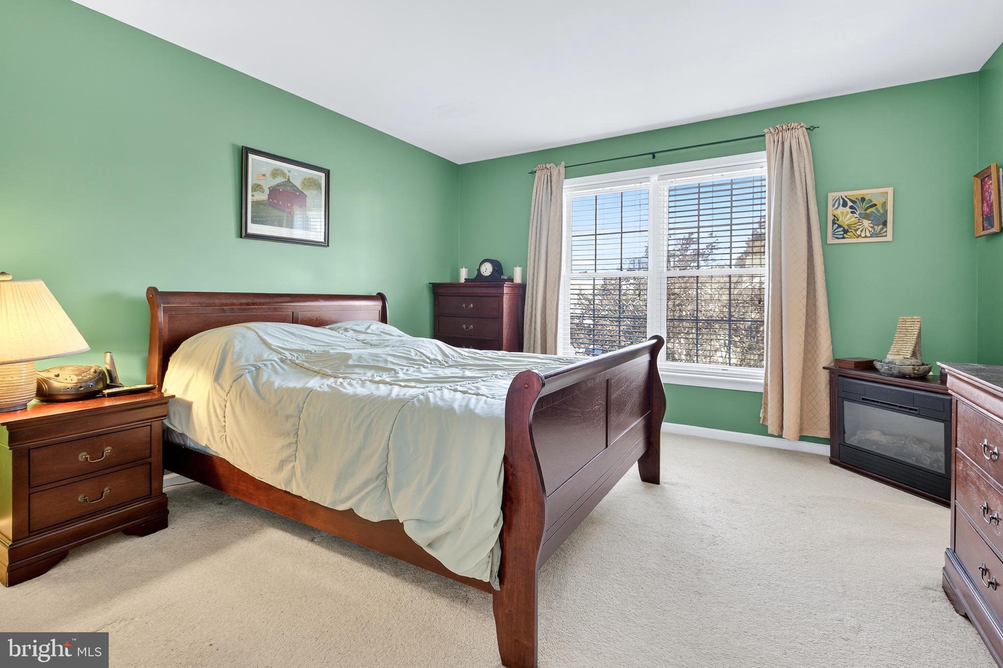 762 Keller Drive Lititz, PA 17543 - Photo 10 of 16 a bed room with a bed and a couch