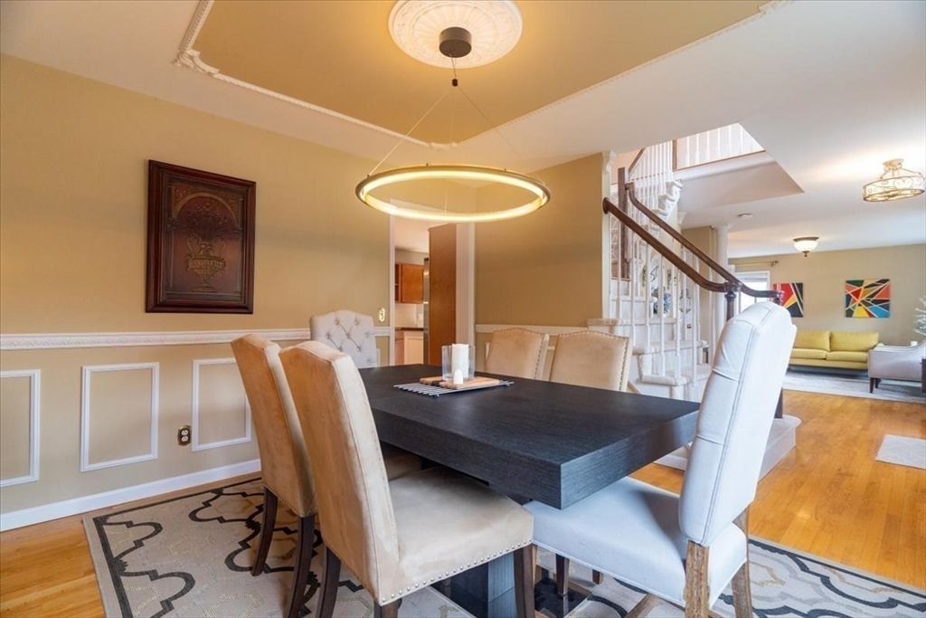 82 Hammersmith Drive Saugus, MA 01906 - Photo 15 of 42 a view of a dining room with furniture and a table