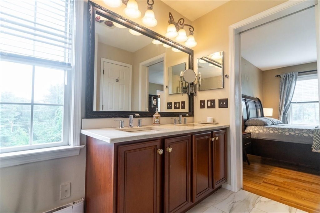 82 Hammersmith Drive Saugus, MA 01906 - Photo 24 of 42 a kitchen with a sink and a window