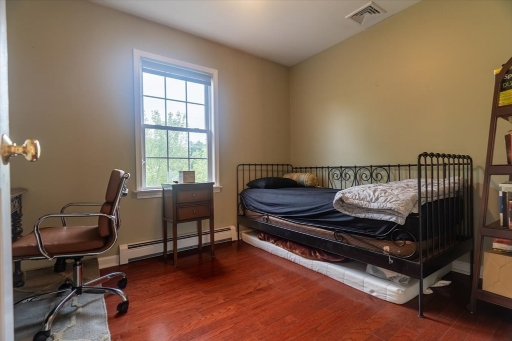 82 Hammersmith Drive Saugus, MA 01906 - Photo 31 of 42 a view of a workspace with furniture and a window
