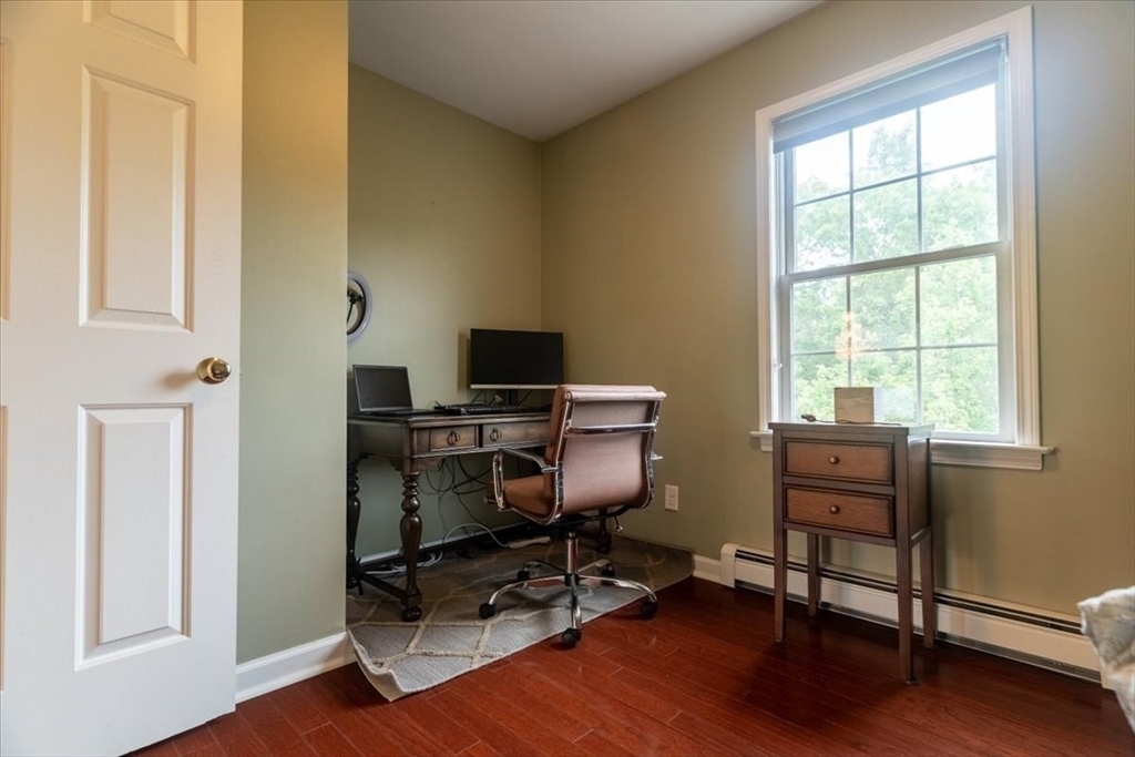 82 Hammersmith Drive Saugus, MA 01906 - Photo 32 of 42 a view of a workspace with furniture and a window