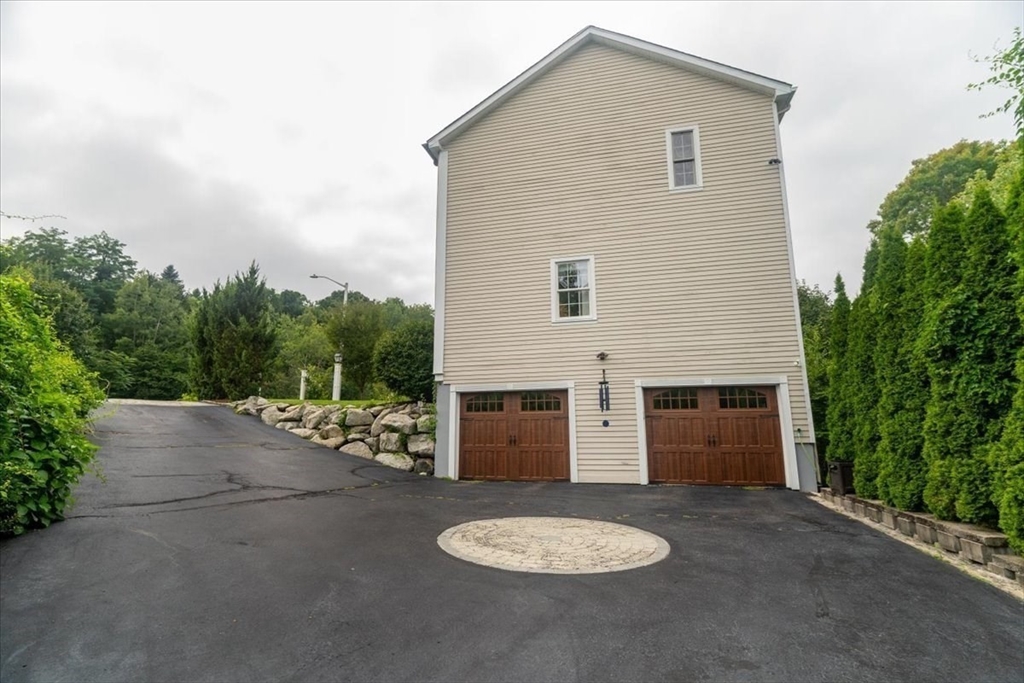 82 Hammersmith Drive Saugus, MA 01906 - Photo 37 of 42 a view of a chairs with a small yard