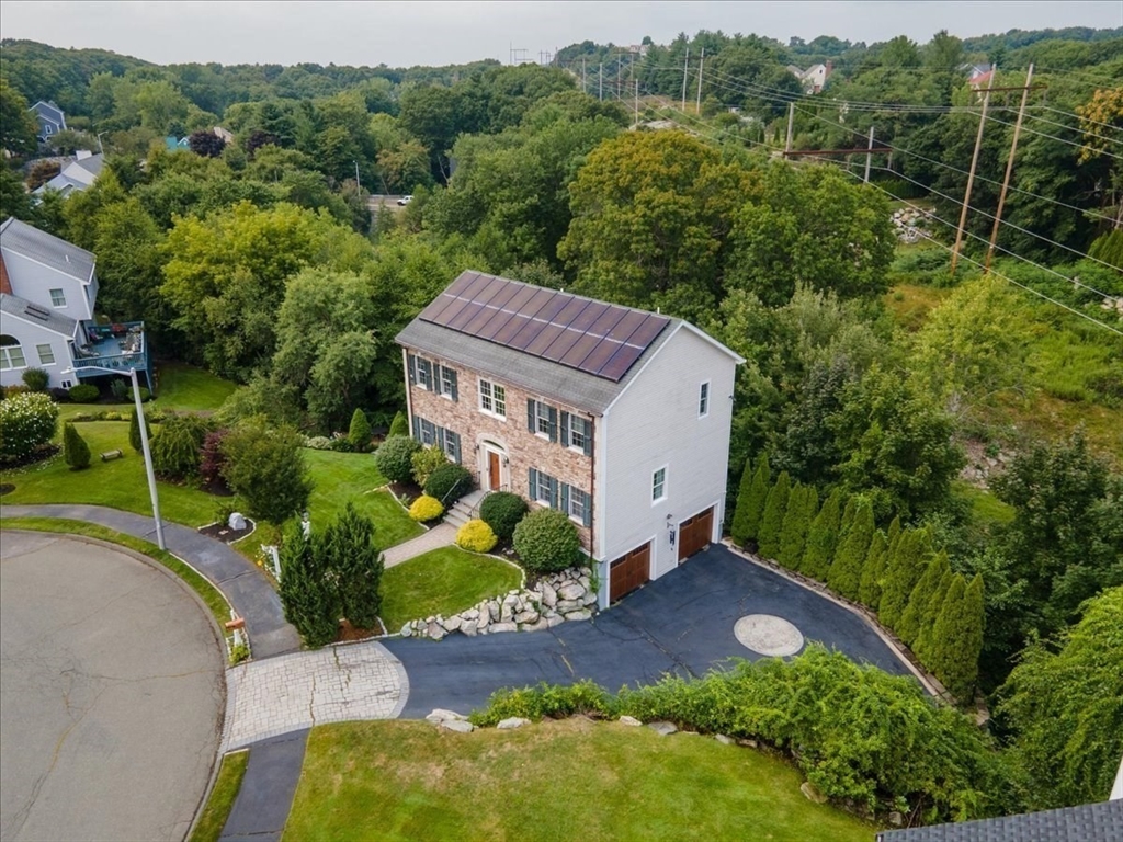82 Hammersmith Drive Saugus, MA 01906 - Photo 41 of 42 an aerial view of a house with a yard and street