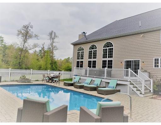 1109 Walnut Plain Road Rochester, MA 02770 - Photo 1 of 20 a view of a house with a backyard