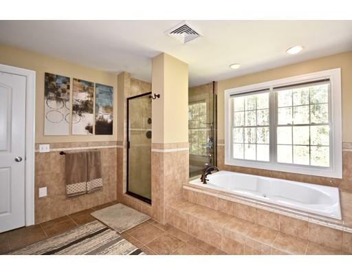1109 Walnut Plain Road Rochester, MA 02770 - Photo 17 of 20 a bathroom with a tub shower and sink