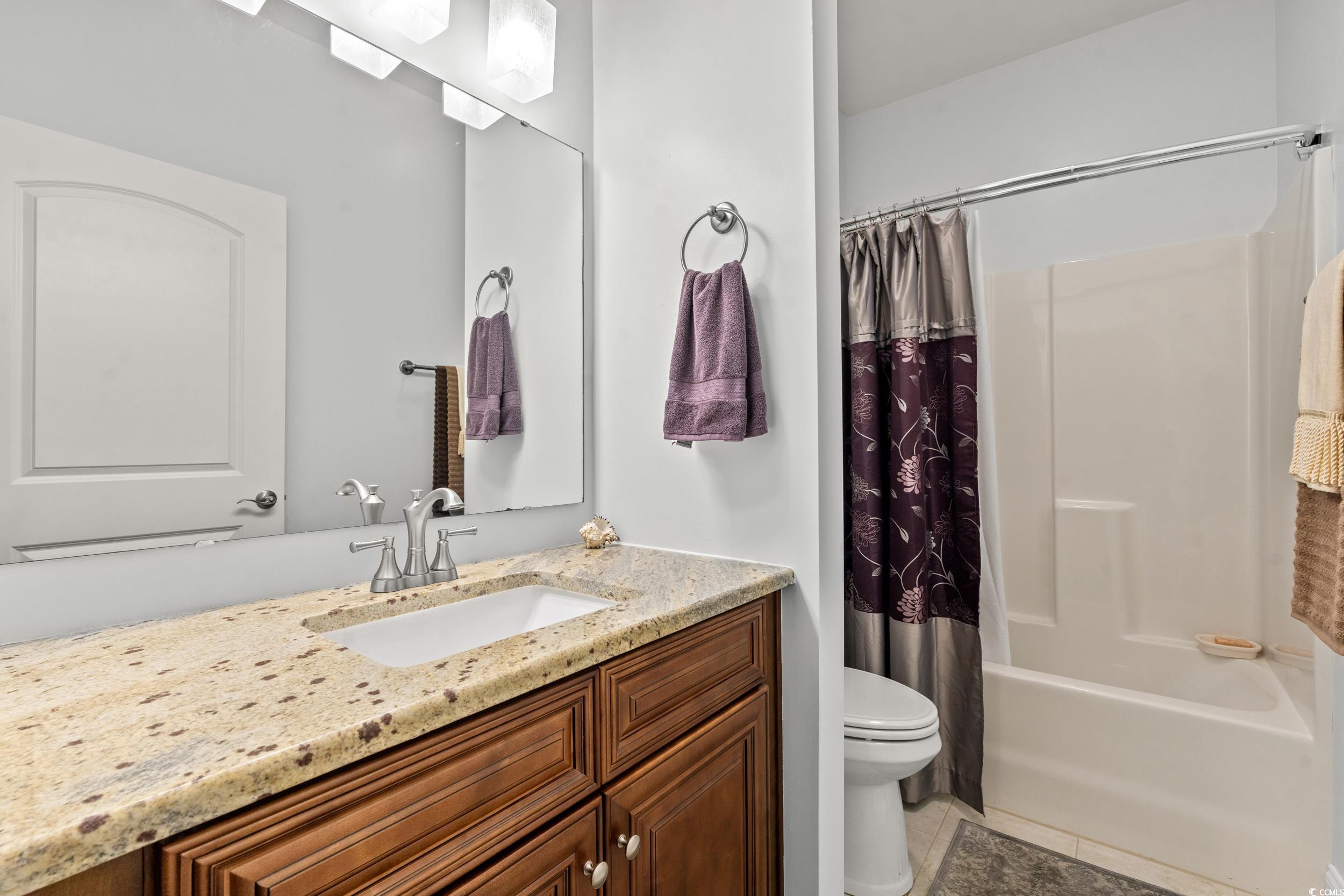 860 Tilly Lake Road Conway, SC 29526 - Photo 13 of 38 Full bathroom with vanity, toilet, tile patterned